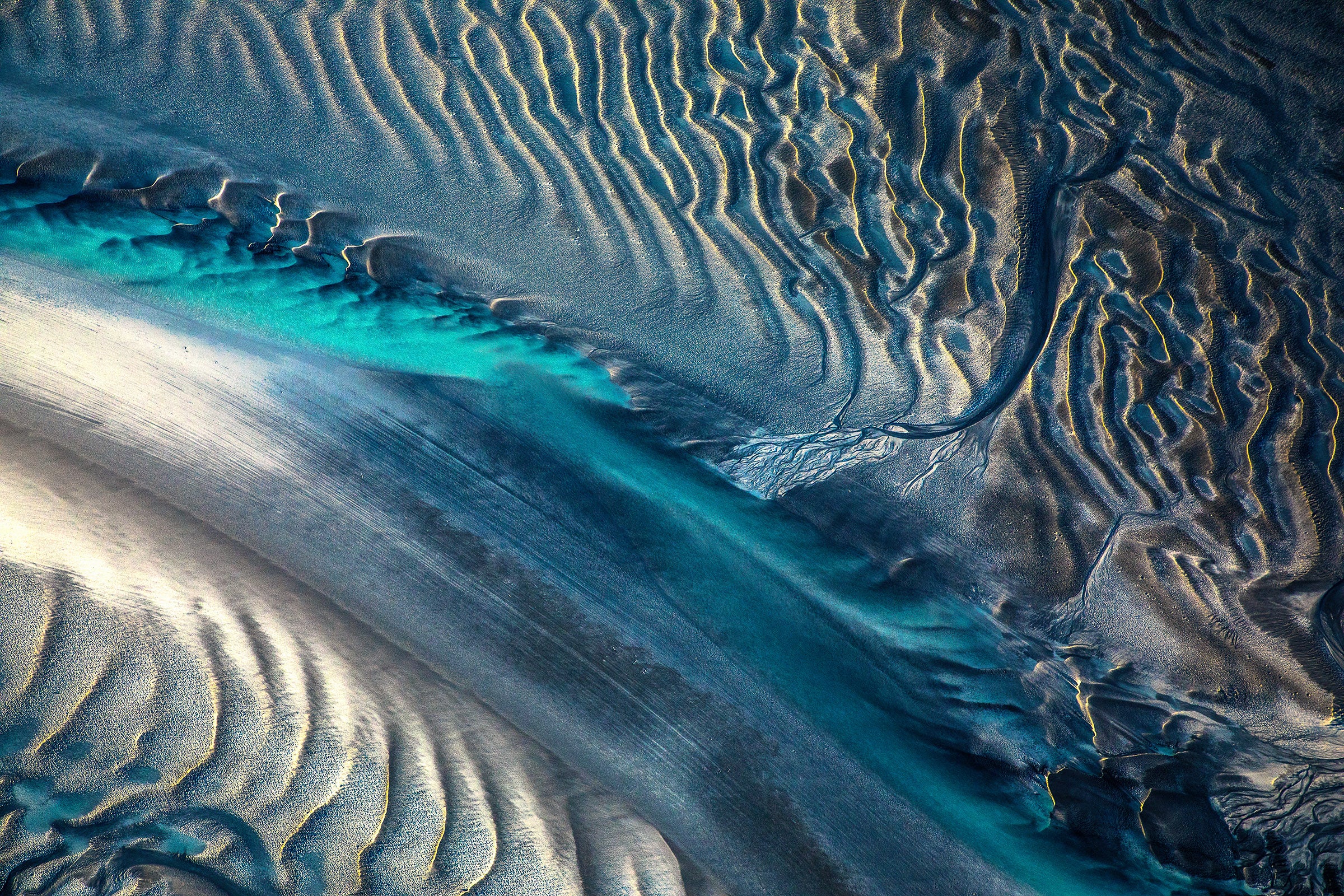 Australia coastline, sweeping wave patterns forming textured ocean surface, aerial photography – Sean Scott Photography