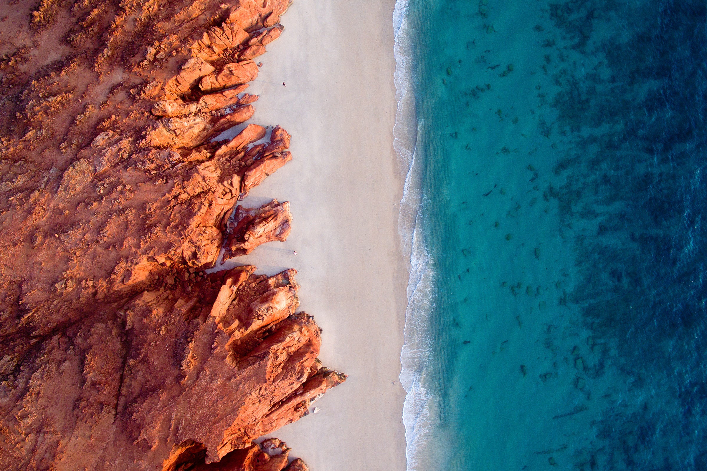 Australia coastline, abstract contrast of red earth and blue ocean textures, aerial photography – Sean Scott Photography