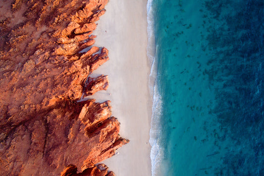 Australia coastline, abstract contrast of red earth and blue ocean textures, aerial photography – Sean Scott Photography