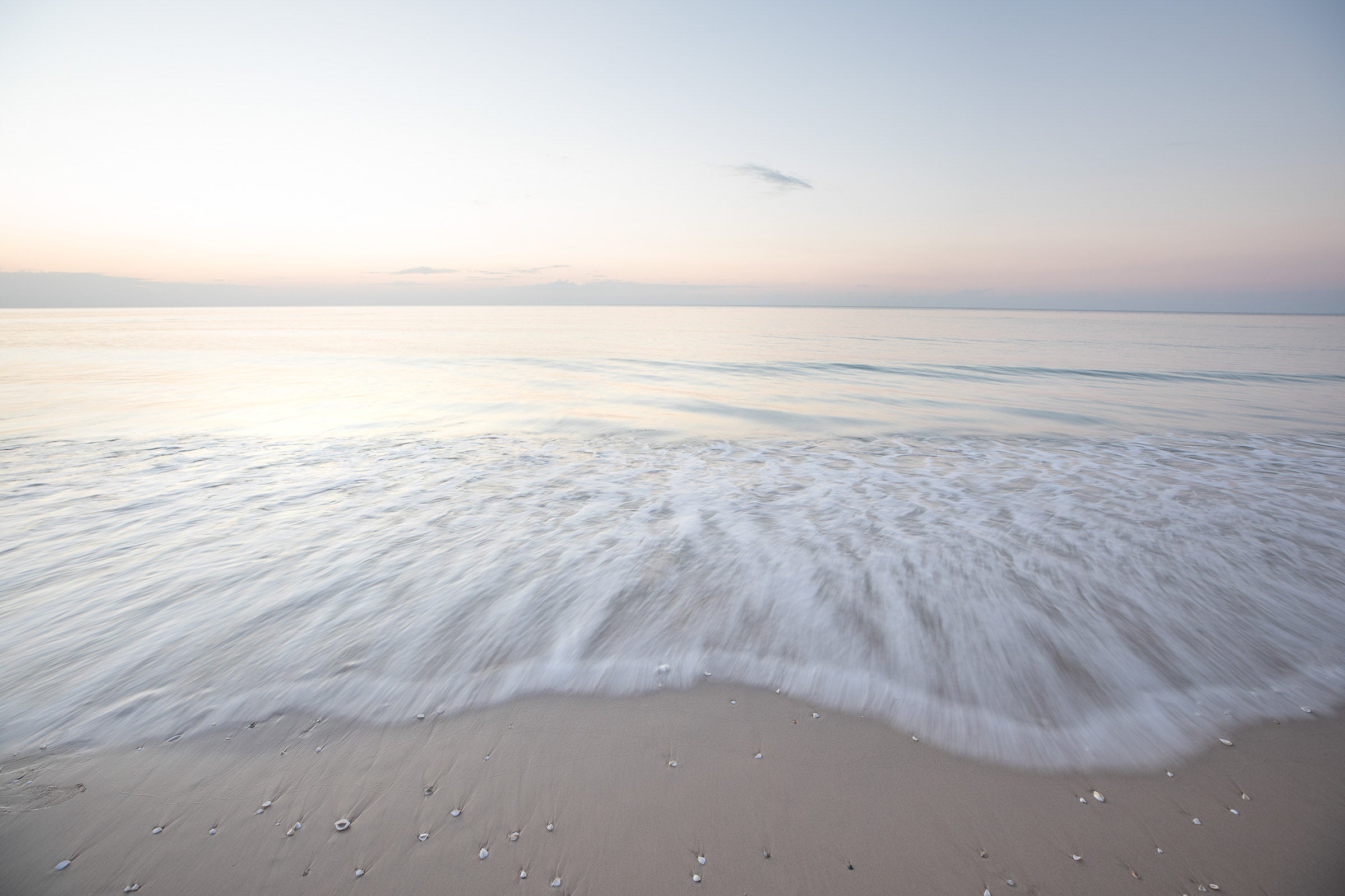 Fraser Island Queensland Australia, soft sand dunes meeting ocean under pastel sky, landscape photography – Sean Scott Photography