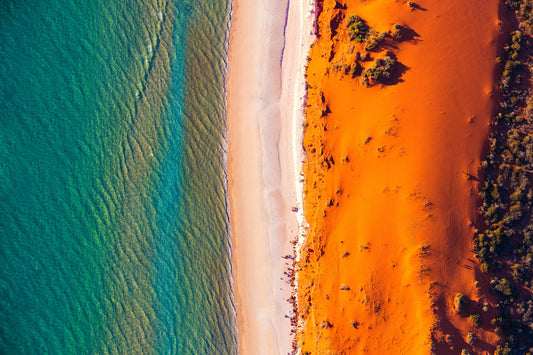 Australia coastline, bold contrast of red earth and blue ocean in abstract view, aerial photography – Sean Scott Photography