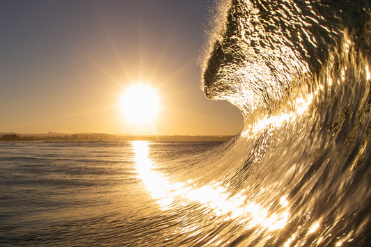 Burleigh Heads Gold Coast Australia, golden light reflecting across ocean and rocky headland, landscape photography – Sean Scott Photography