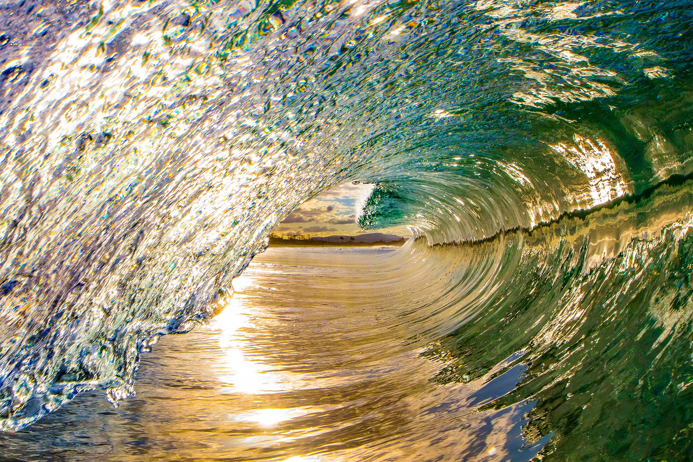 Gold Coast Australia, golden ocean wave breaking along the shoreline, aerial photography – Sean Scott Photography