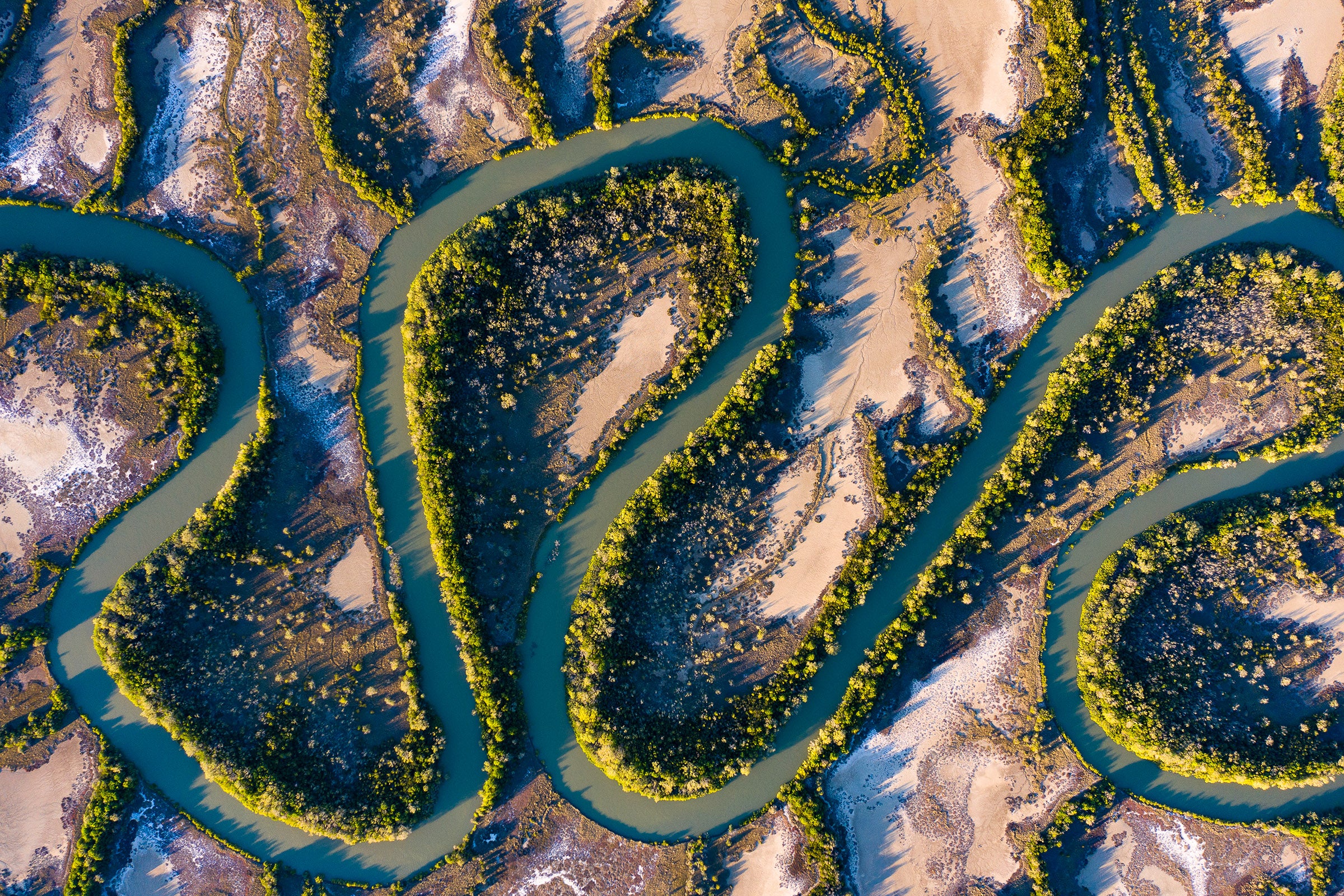 Australian Outback, winding desert river system through remote landscape, aerial photography – Sean Scott Photography