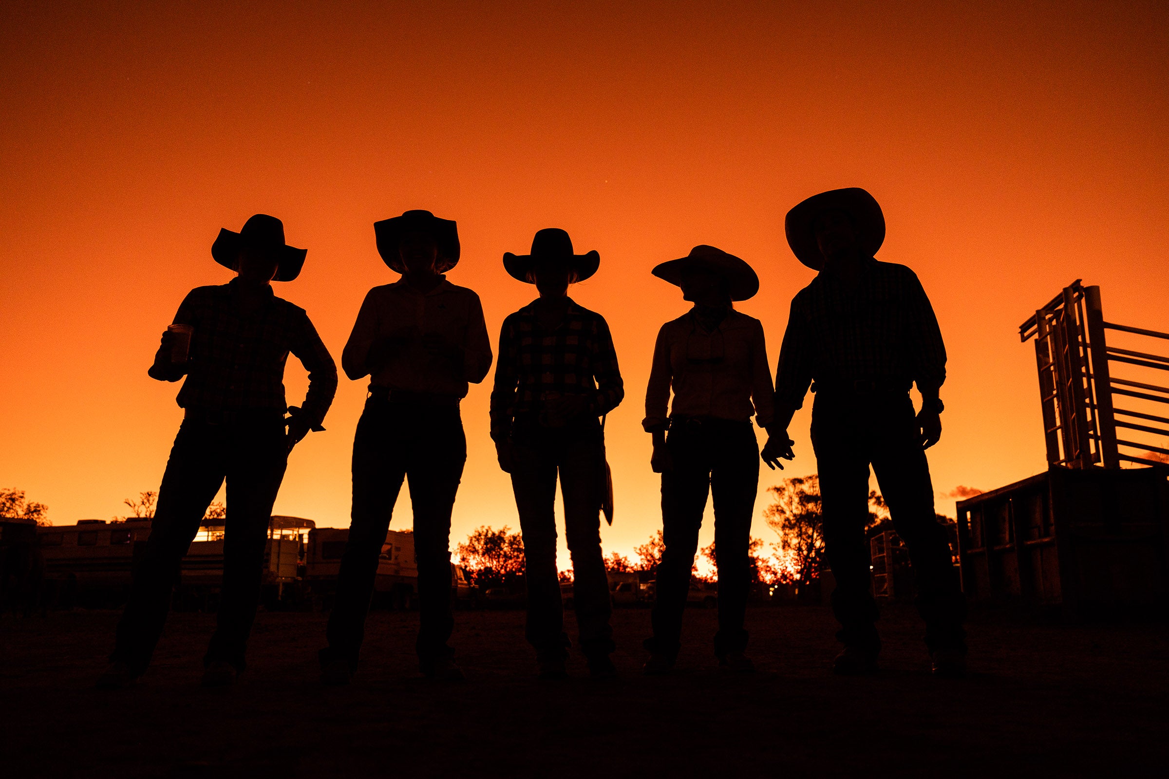 Australian Outback, silhouettes of people standing at sunset horizon, landscape photography – Sean Scott Photography