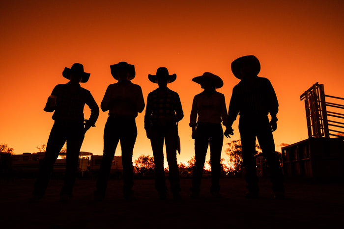 Australian Outback, silhouettes of people standing at sunset horizon, landscape photography – Sean Scott Photography