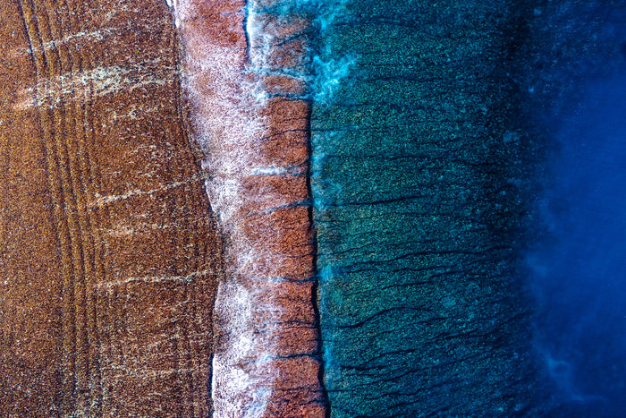 Ningaloo Reef Western Australia, vibrant coral reef and deep blue ocean patterns, aerial photography – Sean Scott Photography