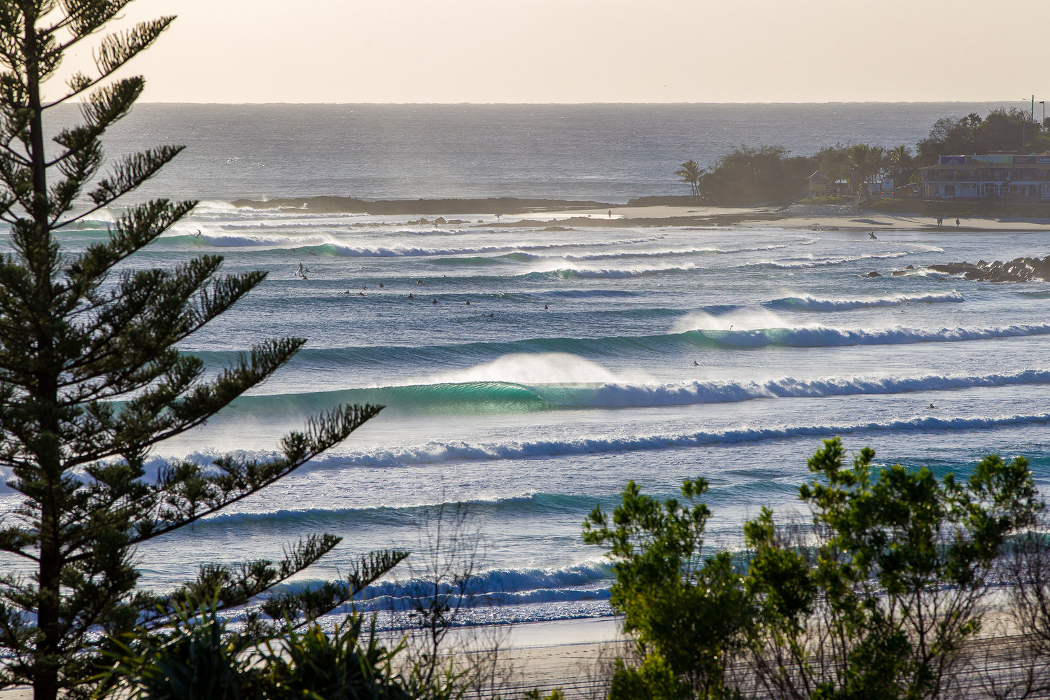 Coolangatta Gold Coast Australia, surfers riding waves along the coastline, landscape photography – Sean Scott Photography