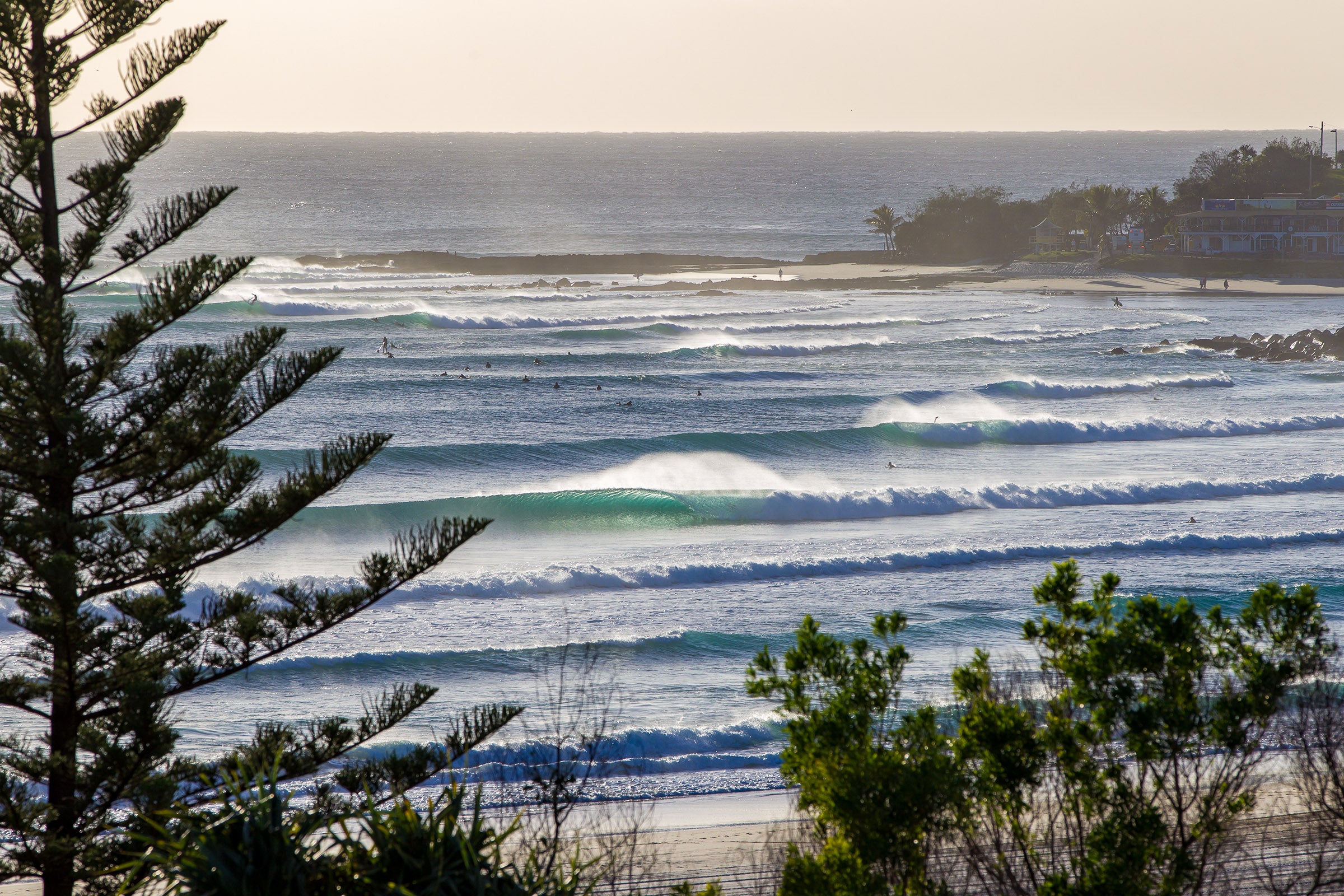 Coolangatta Gold Coast Australia, surfers riding waves along the coastline, landscape photography – Sean Scott Photography