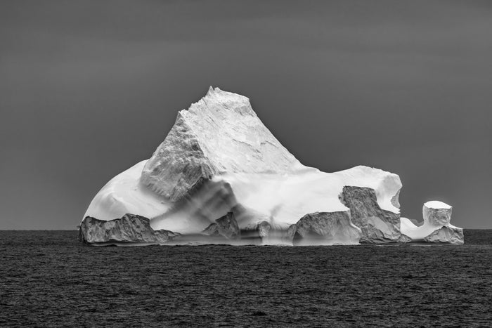 Antarctica, moody seascape with dark clouds and iceberg formations, fine art photography – Sean Scott Photography